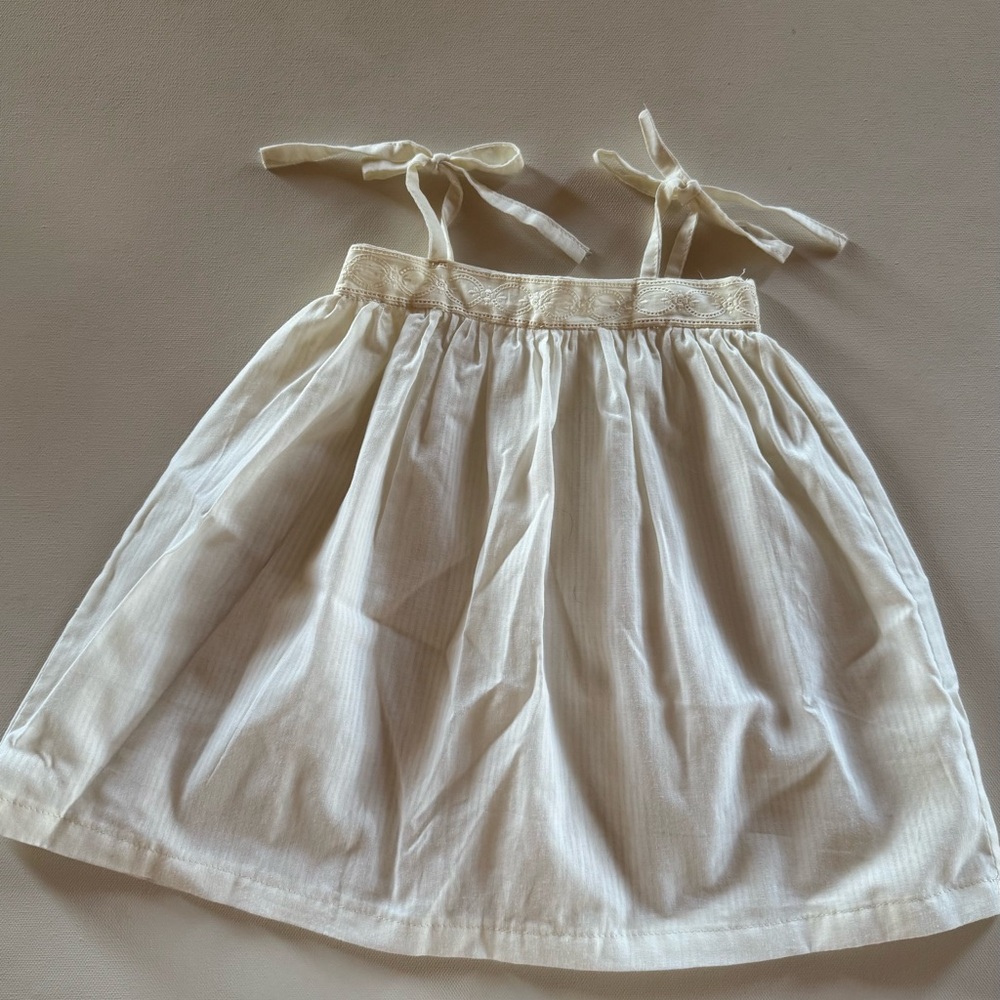 Baby girl ivory embroidered tie dress